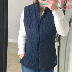 Blue vest.